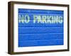 Painted Blue Brick Wall with No Parking Sign-John Nordell-Framed Premium Photographic Print