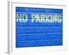 Painted Blue Brick Wall with No Parking Sign-John Nordell-Framed Photographic Print