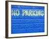 Painted Blue Brick Wall with No Parking Sign-John Nordell-Framed Photographic Print