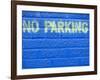 Painted Blue Brick Wall with No Parking Sign-John Nordell-Framed Photographic Print