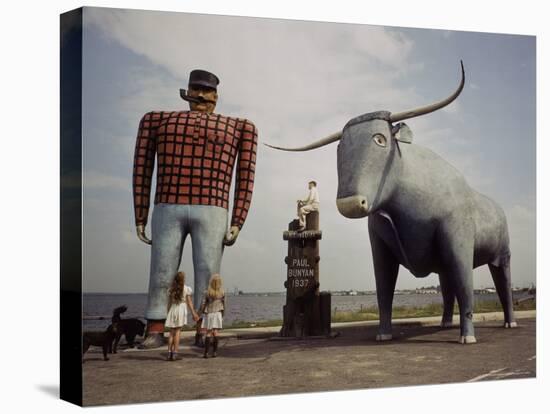 Painted Concrete Sculpture of Paul Bunyon and His Blue Ox, Babe Standing on Shores of Lake Bemidji-Andreas Feininger-Stretched Canvas