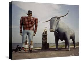 Painted Concrete Sculpture of Paul Bunyon and His Blue Ox, Babe Standing on Shores of Lake Bemidji-Andreas Feininger-Stretched Canvas