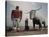 Painted Concrete Sculpture of Paul Bunyon and His Blue Ox, Babe Standing on Shores of Lake Bemidji-Andreas Feininger-Stretched Canvas