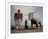 Painted Concrete Sculpture of Paul Bunyon and His Blue Ox, Babe Standing on Shores of Lake Bemidji-Andreas Feininger-Framed Photographic Print