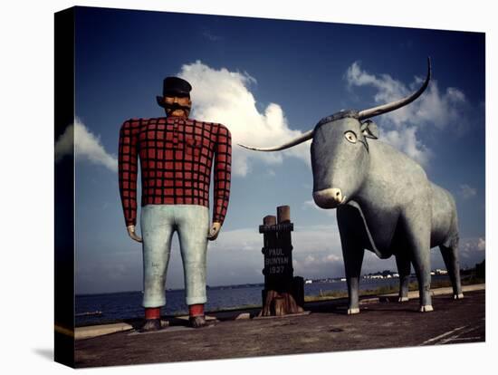 Painted Concrete Sculpture of Paul Bunyon and His Blue Ox, Babe Standing on Shores of Lake Bemidji-Andreas Feininger-Stretched Canvas