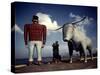 Painted Concrete Sculpture of Paul Bunyon and His Blue Ox, Babe Standing on Shores of Lake Bemidji-Andreas Feininger-Stretched Canvas