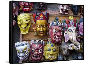 Painted face masks on display in the historical Newar city of Bhaktapur, Nepal, Asia-Alex Treadway-Framed Stretched Canvas