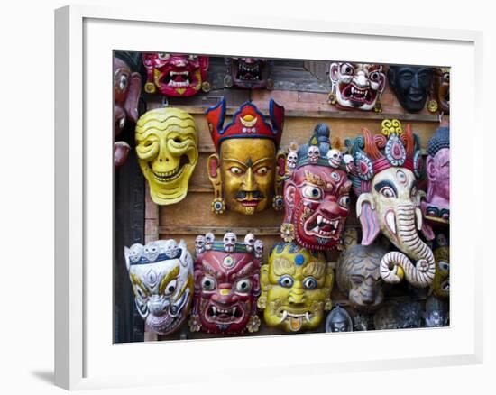 Painted face masks on display in the historical Newar city of Bhaktapur, Nepal, Asia-Alex Treadway-Framed Photographic Print