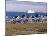 Painted Village Houses in Front of Icebergs in Disko Bay, West Coast, Greenland-Anthony Waltham-Mounted Photographic Print