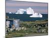 Painted Wooden Fisherman's House in Front of Icebergs in Disko Bay, Disko Island, Greenland-Tony Waltham-Mounted Photographic Print