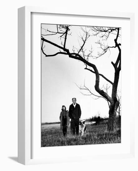 Painter Jackson Pollock Walking in Field with Wife Lee Krasner-Martha Holmes-Framed Photographic Print