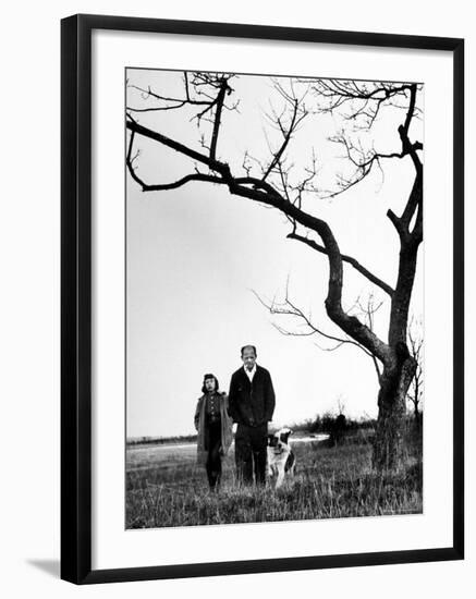 Painter Jackson Pollock Walking in Field with Wife Lee Krasner-Martha Holmes-Framed Photographic Print