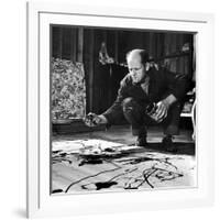 Painter Jackson Pollock Working in His Studio, Cigarette in Mouth, Dropping Paint Onto Canvas-Martha Holmes-Framed Photographic Print