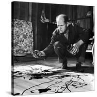 Painter Jackson Pollock Working in His Studio, Cigarette in Mouth, Dropping Paint Onto Canvas-Martha Holmes-Stretched Canvas
