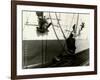 Painters Sitting on Rigging Clean and Paint Side of Ship During Spring Cleaning-J^ Kauffmann-Framed Photographic Print