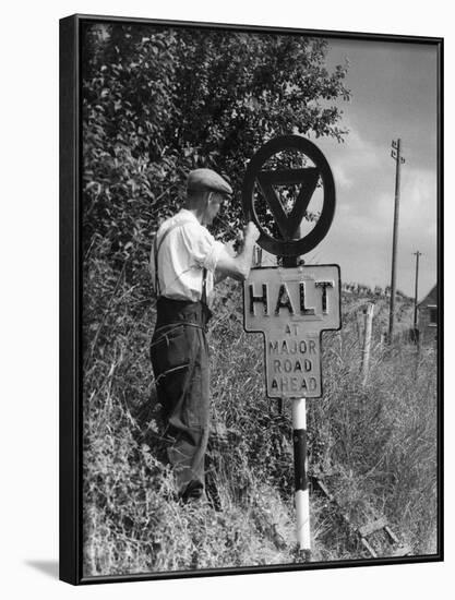 Painting a Road Sign-null-Framed Photographic Print