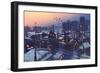 Painting of City Snowy Winter Scene,Rooftops Covered with Snow at Sunset-Tithi Luadthong-Framed Art Print