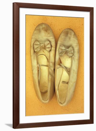 Pair of Ballet or Dancing Shoes Once White But Now Used and Grubby Sitting One Face Down-Den Reader-Framed Photographic Print