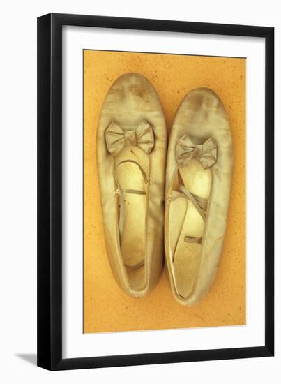 Pair of Ballet or Dancing Shoes Once White But Now Used and Grubby Sitting One Face Down-Den Reader-Framed Photographic Print