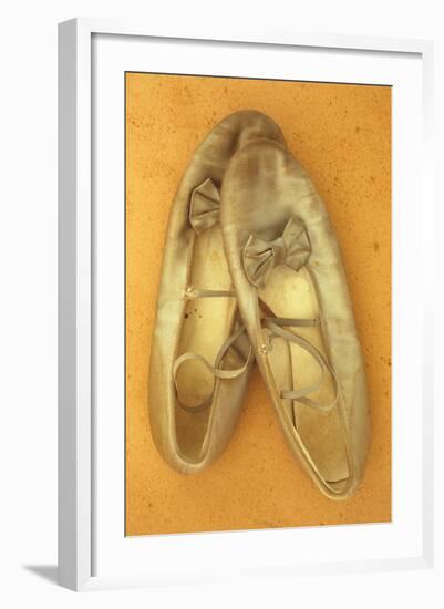 Pair of Ballet or Dancing Shoes Once White But Now Used and Grubby Sitting One Face Down-Den Reader-Framed Photographic Print