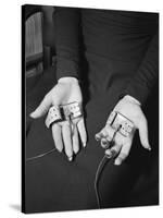 Pair of Hands Wearing Lie Detector Device-Sam Shere-Stretched Canvas