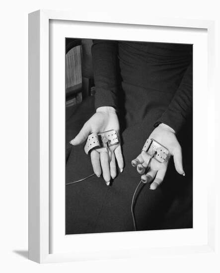 Pair of Hands Wearing Lie Detector Device-Sam Shere-Framed Photographic Print