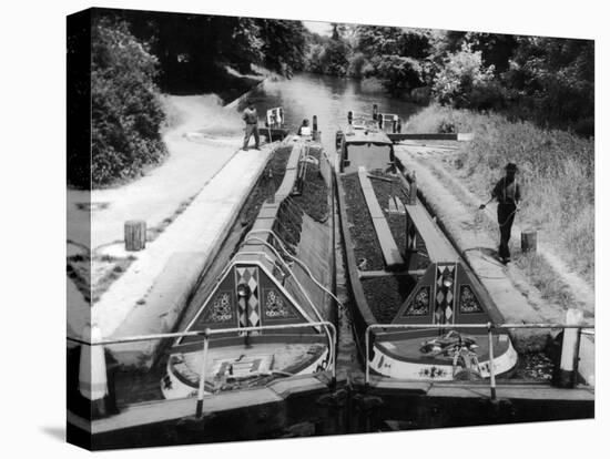 Pair of Laden Narrow Boats with Their Cargoes of Coal Passing Through a Lock-null-Stretched Canvas