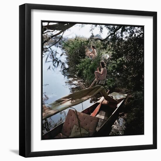 Pair of Nude Women Sitting Along the River Bank of the Thames-William Sumits-Framed Photographic Print