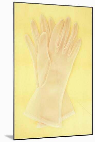 Pair of White Nylon Ladies See-Through Gloves Lying on Antique Paper-Den Reader-Mounted Photographic Print