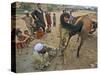 Pakistan Youth, Holds a Horse's Hoof While a Man Prepares to Place a New Shoe-null-Stretched Canvas