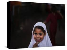 Pakistani Girl Waits for Her Mother to Get Rice During a Donated Food Distribution at the Beri Iman-null-Stretched Canvas