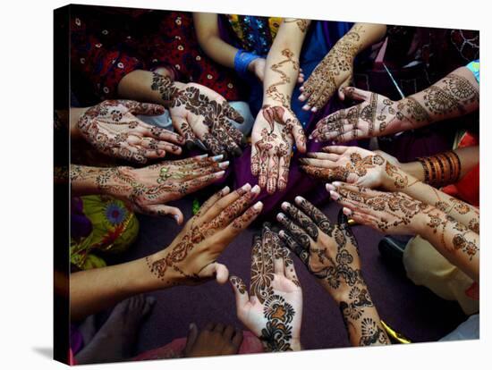 Pakistani Girls Show Their Hands Painted with Henna Ahead of the Muslim Festival of Eid-Al-Fitr-Khalid Tanveer-Stretched Canvas