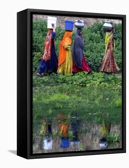 Pakistani Women Walking Home after Collecting Fresh Water on the Outskirts of Islamabad-null-Framed Stretched Canvas