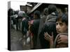 Pakistanis Wait in Line to Receive Food as Aid-null-Stretched Canvas