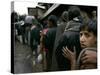 Pakistanis Wait in Line to Receive Food as Aid-null-Stretched Canvas