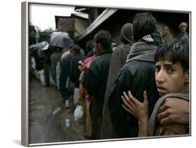 Pakistanis Wait in Line to Receive Food as Aid-null-Framed Photographic Print
