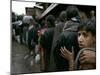 Pakistanis Wait in Line to Receive Food as Aid-null-Mounted Photographic Print