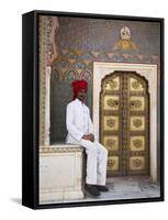 Palace Guard Sitting at Rose Gate in Pitam Niwas Chowk, City Palace, Jaipur, Rajasthan, India, Asia-Ian Trower-Framed Stretched Canvas