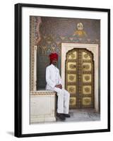 Palace Guard Sitting at Rose Gate in Pitam Niwas Chowk, City Palace, Jaipur, Rajasthan, India, Asia-Ian Trower-Framed Photographic Print