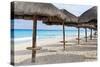 Palapas Lined up on the Beach, Cancun, Mexico-George Oze-Stretched Canvas