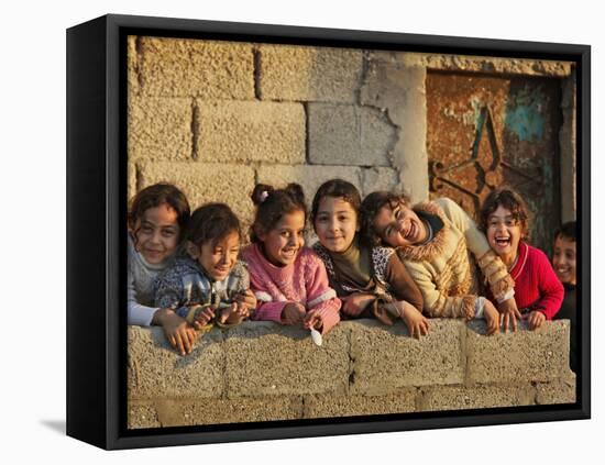 Palestinian Girls Giggle While Photographed Where Shell from an Israeli Gunboat Landed Earlier-null-Framed Stretched Canvas