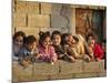 Palestinian Girls Giggle While Photographed Where Shell from an Israeli Gunboat Landed Earlier-null-Mounted Photographic Print