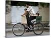Palestinian Man, 28, Takes His Son, 4, and Daughter, 2, on His Bicycle-null-Stretched Canvas
