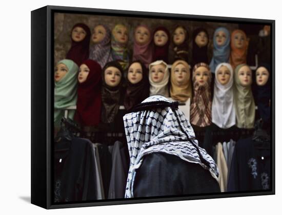 Palestinian Man Passes in Front of a Shop Offering Veils for Sale in Jerusalem's Old City-null-Framed Stretched Canvas