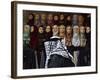 Palestinian Man Passes in Front of a Shop Offering Veils for Sale in Jerusalem's Old City-null-Framed Photographic Print