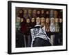 Palestinian Man Passes in Front of a Shop Offering Veils for Sale in Jerusalem's Old City-null-Framed Photographic Print