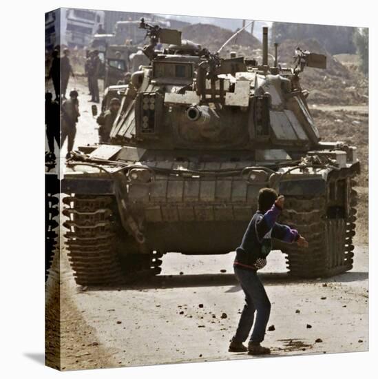 Palestinian Stone Thrower Faces an Israeli Tank, Between Israel and the Gaza Strip-null-Stretched Canvas