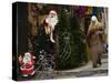Palestinian Woman Walks Past Christmas Decorations at a Shop in Jerusalem's Old City-null-Stretched Canvas