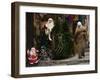 Palestinian Woman Walks Past Christmas Decorations at a Shop in Jerusalem's Old City-null-Framed Photographic Print