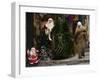 Palestinian Woman Walks Past Christmas Decorations at a Shop in Jerusalem's Old City-null-Framed Photographic Print